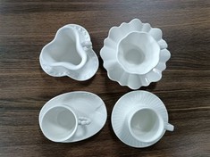 Tazza e piattino irregolari